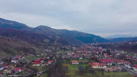 Aerial View of Moeciu de Jos Village in the Carpathian Mountains, Romania Stock Footage 325039335