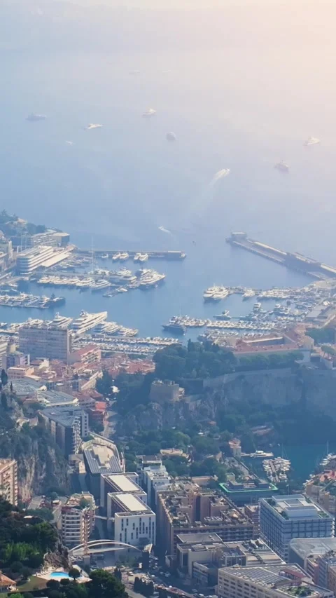 Aerial view of Monaco city state and Port Hercules. Vertical video Stock Footage 346634849