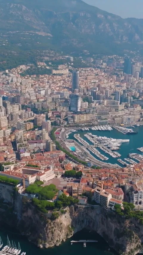 Aerial view of Monaco Monte Carlo bay with luxury yachts. Vertical video Stock Footage 346634462