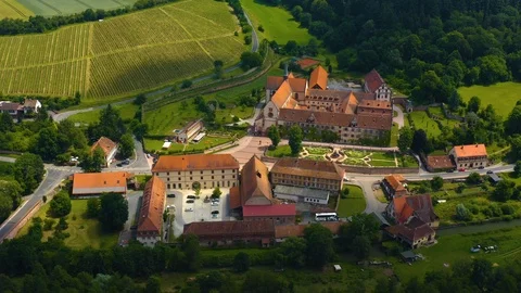 Aerial view of the monastery Bronnbach in Germany. Stock Footage 125585877