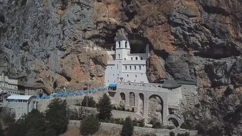 Aerial view of The Monastery of Ostrog, Serbian Orthodox Church. Montenegro Stock Footage 129670152