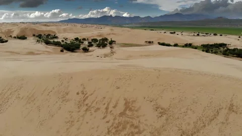 Aerial view of Mongolia Gobi Desert dunes - Arid Landscape and Remote Sandhills Stock Footage 339469264
