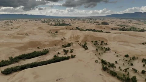 Aerial view of Mongolia Gobi Desert dunes - Aerial Desert and Windblown Terrain Stock Footage 339469466