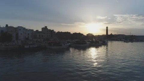 Aerial View of Monopoli, taken at sunset from its port. Stock Footage