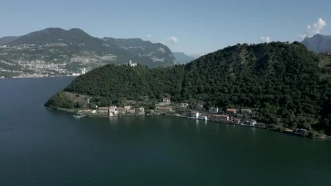 Aerial view, Monte Isola in a sunny spring day. Iseo lake. Tilt 4K Video stock 319961653