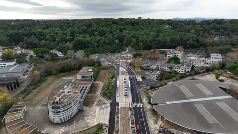 Aerial view of Montpellier tramway modern circular station and tram tracks Stock Footage 337977489