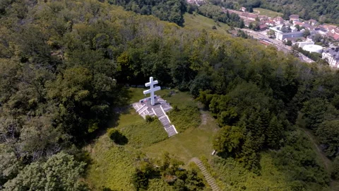 Aerial View of Monument Cross in Forest Stock Footage 291736747