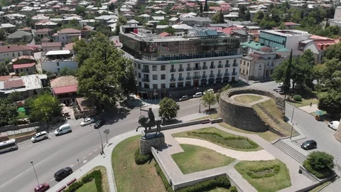 Aerial view of Monument of King Erekle II in Telavi. flying over Batonis Tsikhe Stock Footage 119690650