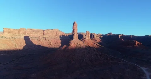 Aerial view of Monument Valley in shadow and sun Stock Footage 95607648