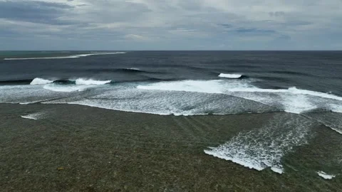 Aerial view of moody waves and reef in tranquil ocean, Fiji. Stock Footage 312749397