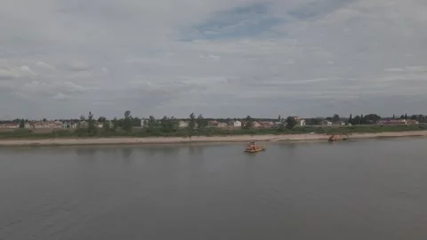 Aerial View of Moored Barges and Power Plant on Han River Bank Vídeos de archivo 343694612