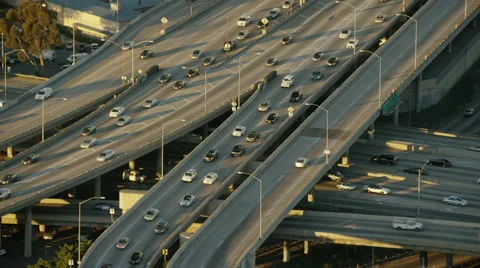 Aerial view of morning commuters using freeway system Los Angeles Stock Footage 64778583