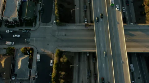 Aerial view of morning commuters using freeway system Los Angeles Stock Footage 64778737