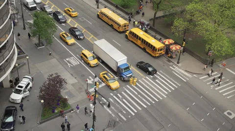 Aerial view of morning traffic at an intersection Stock Footage 64287855