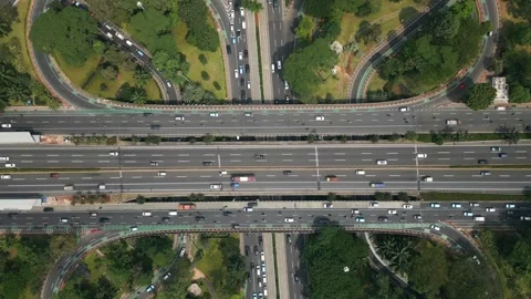 Aerial view of morning traffic on multi-lane road in downtown Jakarta, Indonesia Stock Footage 281908298