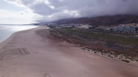 Aerial view of Morro Jable beach and town, Fuerteventura Stock Footage 310401095