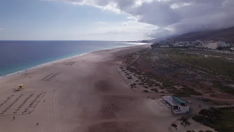 Aerial view of Morro Jable under cloudy sky, Fuerteventura Stock Footage 310401554