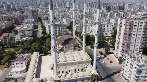 Aerial view of mosque and panorama of city. Mugdat Mosque, Mersin, Turkey Stock Footage 143379746