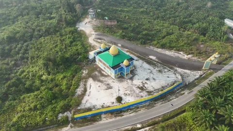 Aerial view of a mosque building located in a rural landscape Stock Footage 340594507