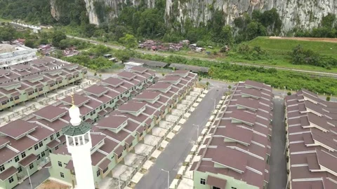 Aerial view of Mosque, parking lot and small town in Gua Musang, kelantan Stock Footage 190808577
