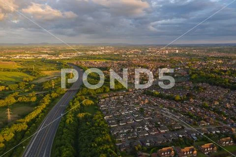 Aerial View of a Motorway and British Housing Stock Photos