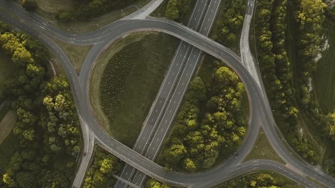 Aerial View of a Motorway Intersection during Sunset Stock Footage 111991582