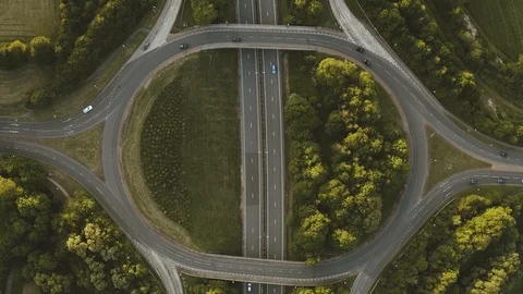 Aerial View of a Motorway Intersection during Sunset Stock Footage 111991623