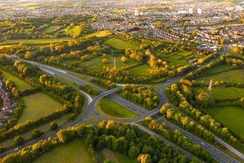Aerial View of a Motorway Intersection During Sunset Stock Photos