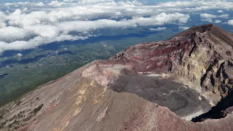 Aerial view of Mount Agung and sea in the background in Bali, Indonesia Stock Footage 284397255