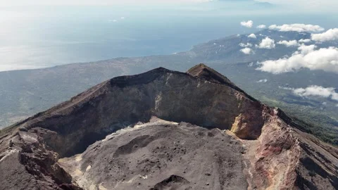 Aerial view of Mount Agung and sea in the background in Bali, Indonesia Stock Footage 284397283