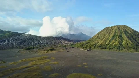 Aerial view of Mount Bromo, Mount Batok, and Mount Semeru Stock Footage 236453640