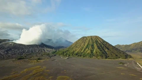 Aerial view of Mount Bromo, Mount Batok, and Mount Semeru Stock Footage 236453813