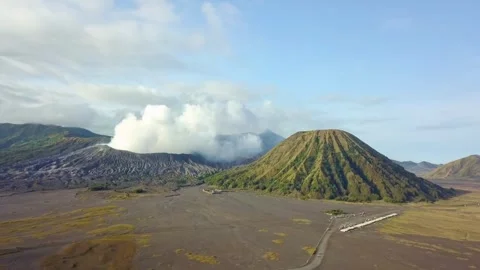 Aerial view of Mount Bromo, Mount Batok, and Mount Semeru Stock Footage 277104467