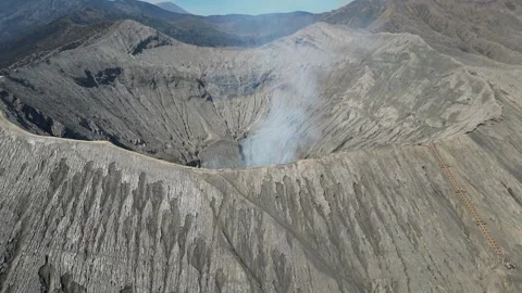 Aerial view of Mount Bromo volcano crater in Java, Indonesia Stock Footage 253542419