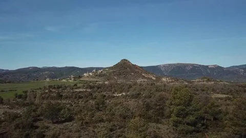 Aerial view of a mount in Huesca, surrounded by mountains Stock Footage 304237515