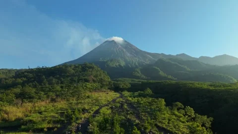 Aerial view of Mount Merapi with smoke at the peak, Indonesia. Stock Footage 334913385