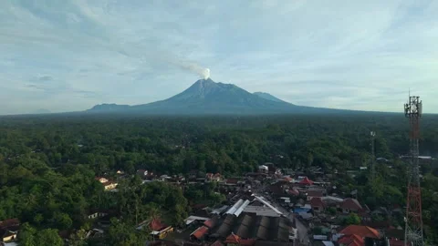 Aerial view of Mount Merapi volcano and Kemalang village, Indonesia. Stock Footage 334772349