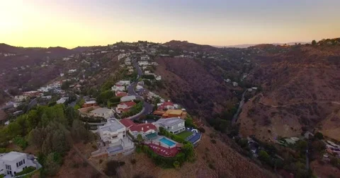 Aerial view of Mount Olympus neighborhood Hollywood Hills Los Angeles California Stock Footage