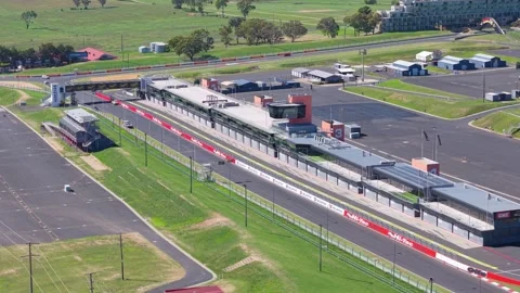 Aerial view of Mount Panorama pit lane and race facilities in Bathurst NSW Video stock 334926296