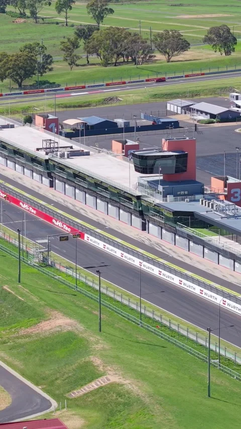 Aerial view of Mount Panorama pit lane and race facilities in Bathurst NSW Stock Footage 335001202