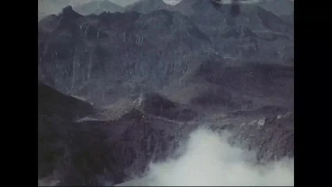 Aerial view of Mount Saint Helens covered with clouds - 1980 Stock Footage 99099555