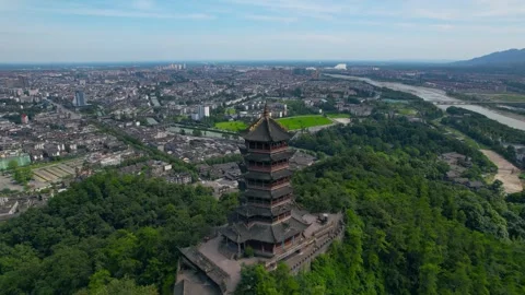 Aerial View of Mountain Ancient Tower and Town River View in Dujiangyan China Stock Footage 337927193