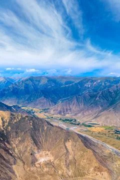 Aerial view of mountain and clouds scenery in Tibet. Stock Photos