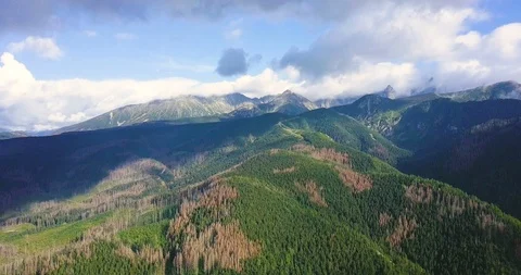 Aerial view of mountain at background with motion clouds over the Bukit Tingg Stock Footage 93304011