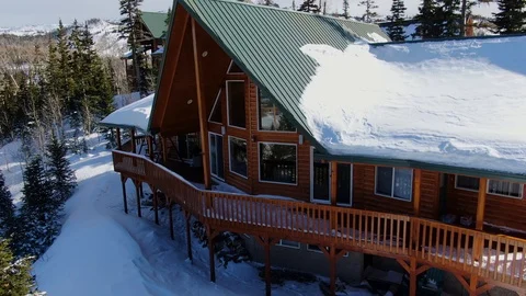 Aerial View Mountain Chalet Brian Head Utah 4K snow Log Cabin Stock Footage 102178312