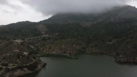 Aerial view of the mountain in the clouds Stock Footage 239942899