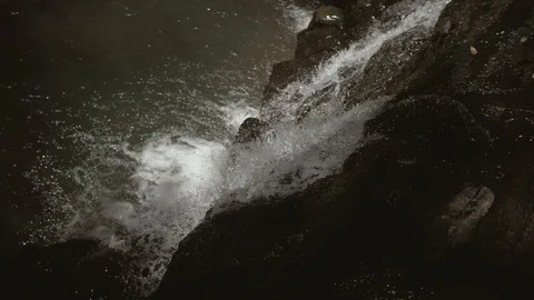 Aerial view of mountain forest waterfall. Water breaks from the rocks and falls Stock Footage 109171995