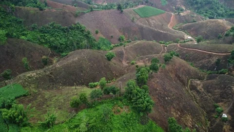 Aerial view of a mountain that has been cut down and destroyed by humans. 스톡 동영상 311966130