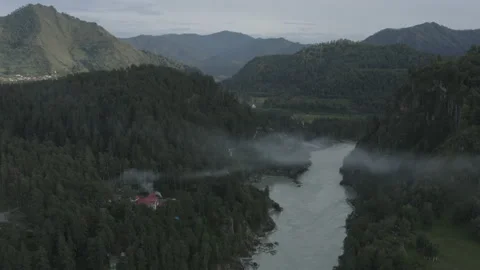 Aerial view mountain Katun river in between mountains and clouds 2 Stock Footage 137873442