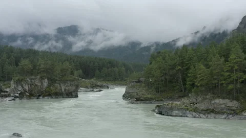 Aerial view mountain Katun river in between mountains and clouds 4 Stock Footage 137873903
